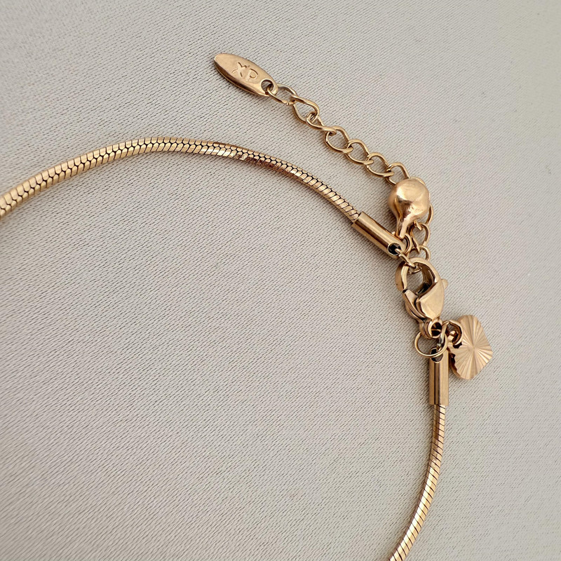 دستبند زنانه ژوپینگ طرح ماری گرد مدل X0001020